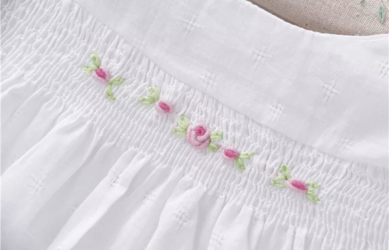 Classic White Cotton Top With Floral Smocking - Image 2