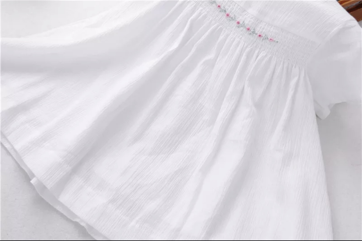 Classic White Cotton Top With Floral Smocking - Image 5